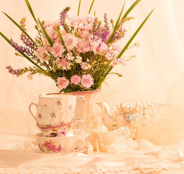 Beautiful spring flowers with vintage service stock photo