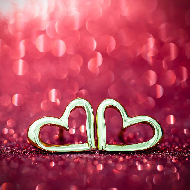 istock Heart ring on the floor with pink bokeh on background 535699545