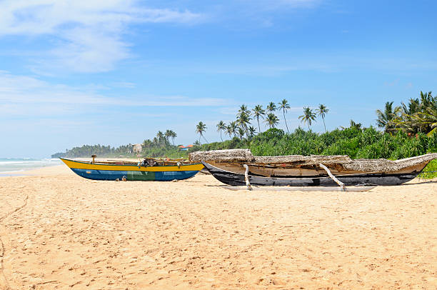 istock fishing boat on the sandy shore 535699555