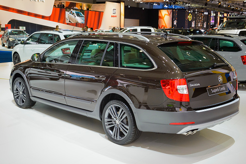 Brussels, Belgium - January 15, 2015: Skoda Superb Combi estate car  on display during the 2015 Brussels motor show. People in the background are looking at the cars.