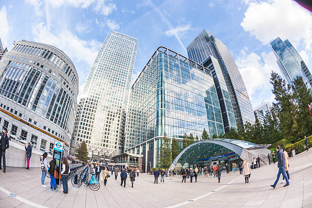 Commuters in Canary Wharf, Modern Financial District of the city. London, United Kingdom - October 30, 2013: Commuters in Canary Wharf, Modern Financial District of the city. bicycle docking station stock pictures, royalty-free photos & images