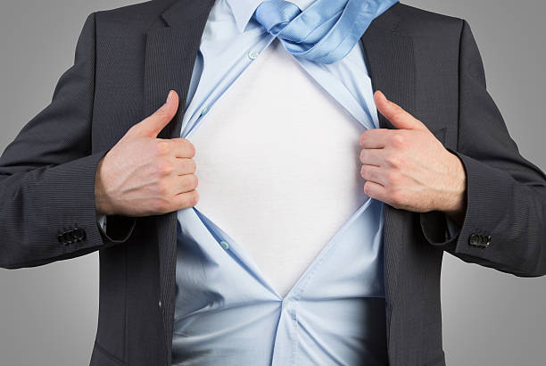 istock businessman open his shirt 535716167
