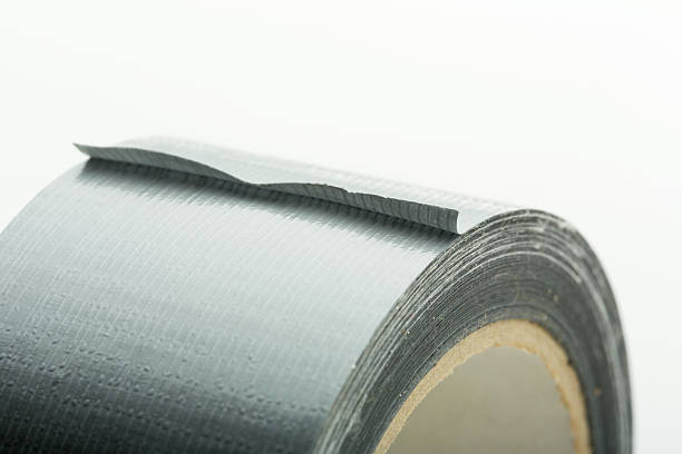 istock Roll of silver adhesive tape 535716287