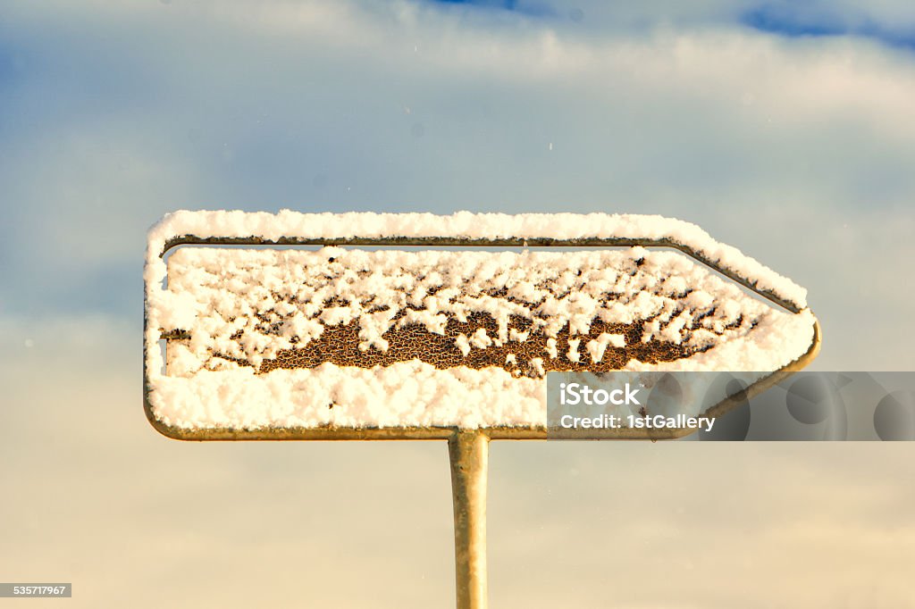 empty directional road sign empty directional road sign (3), pointing arrow with snow in winter season 2015 Stock Photo