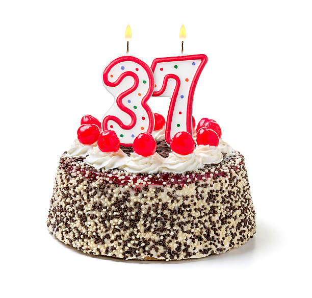 istock Birthday cake with burning candle number 37 535718415