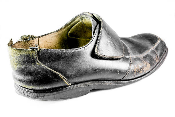 istock Old shoe isolated on a white background 535719895