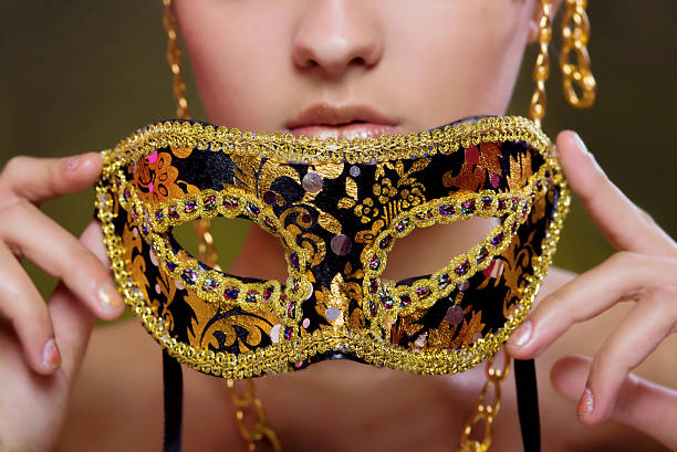 istock Beautiful girl with a masquerade mask 535720857