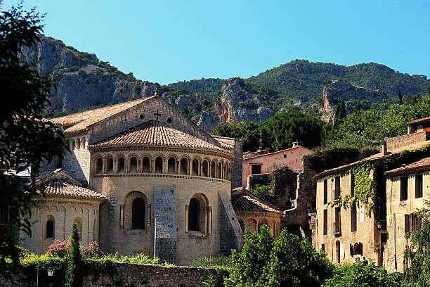 Saint Guilhem le desert church in a cloudy dayDetails in Saint Guilhem le desert, a town in south of France
