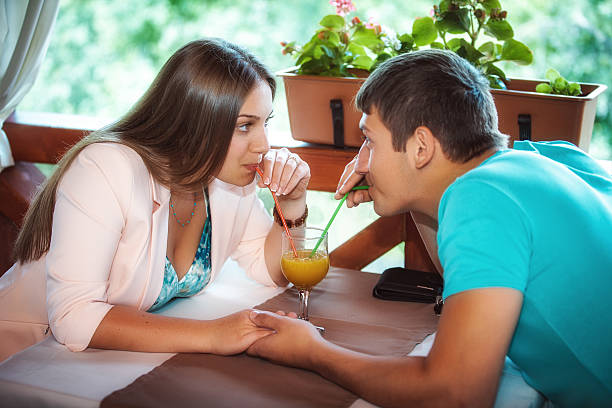 istock young couple in an open-air cafe 535722013