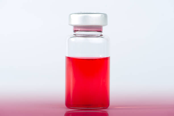 istock Closed up red liquid in injection vials 535723177