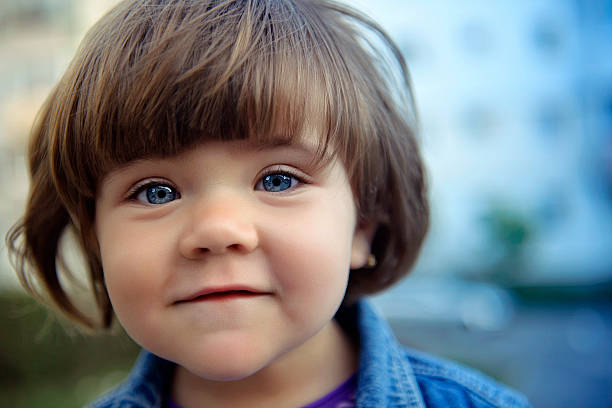 istock brown hair little girl 535723733