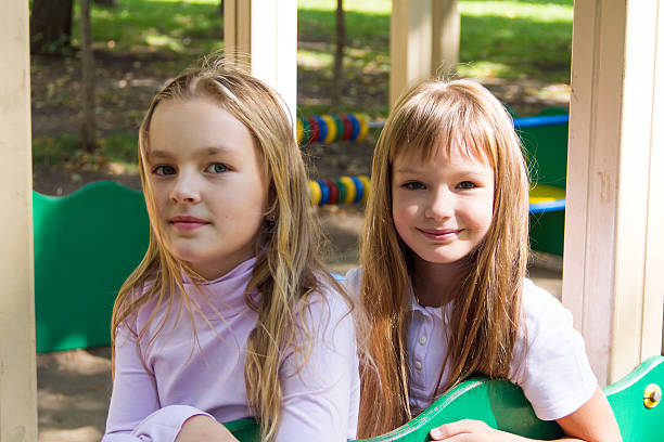 istock Cute two playing girls 535724815