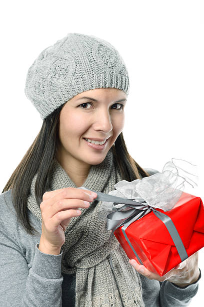 istock Pretty Smiling Woman Holding Gift Box 535724997