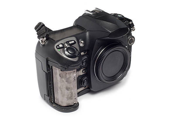 istock Old DSLR Camera with loose rubberon. Isolated on white background 535727337