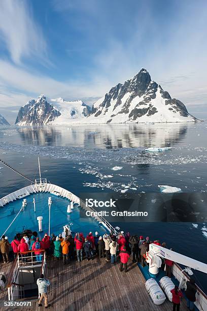 Antartica Tourists On Ship Driving Through Lemaire Channel Stock Photo - Download Image Now