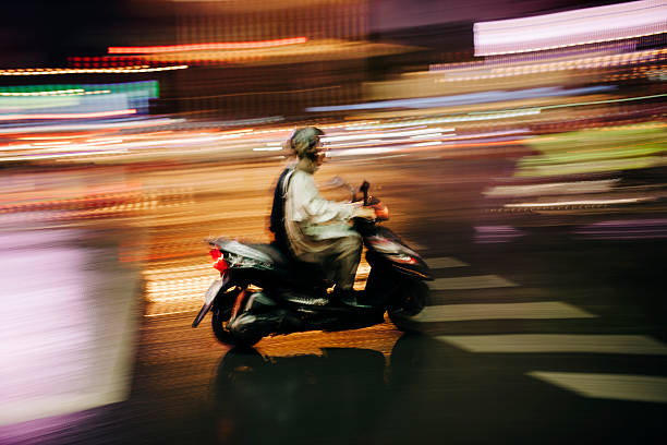 istock Scooter at a Taipei road junction, Taiwan 535761687