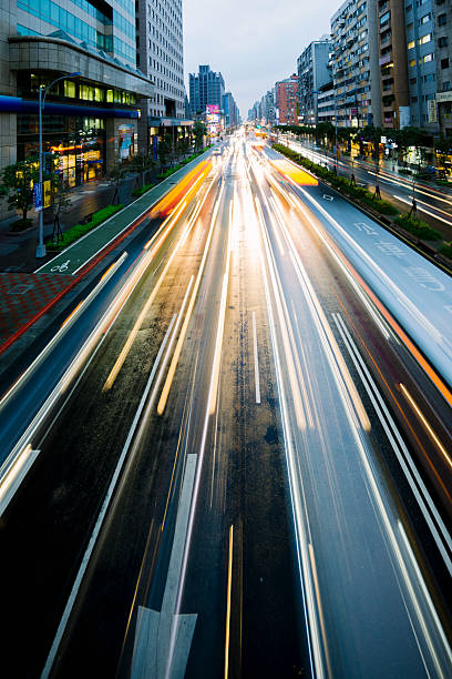 istock Central Taipei roadway, motion blurred with light streaks, Taiwan 535761707