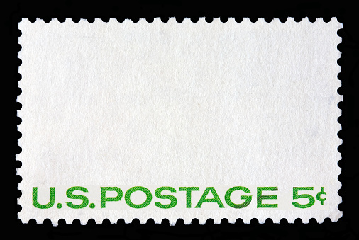 White postage stamp with the writing \