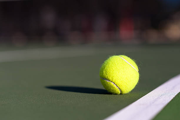 istock Tennis Ball on Court 535764929