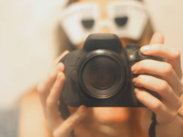 istock Unusual woman taking a photo 535765817