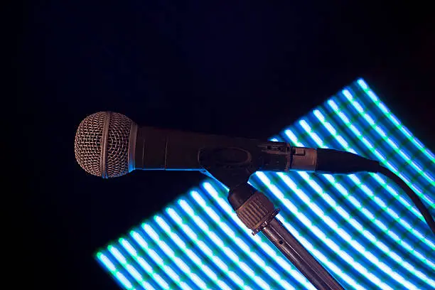 Photo of light blue microphone