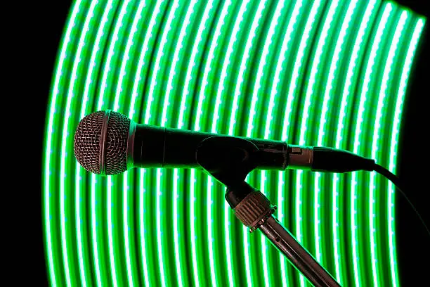 Photo of green arc behind microphone
