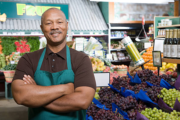 greengrocer - supermarket sales clerk grocer apron ストックフォトと画像