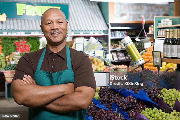 Greengrocer Stock Photo - Download Image Now - Grocer, Retail Clerk, African Ethnicity