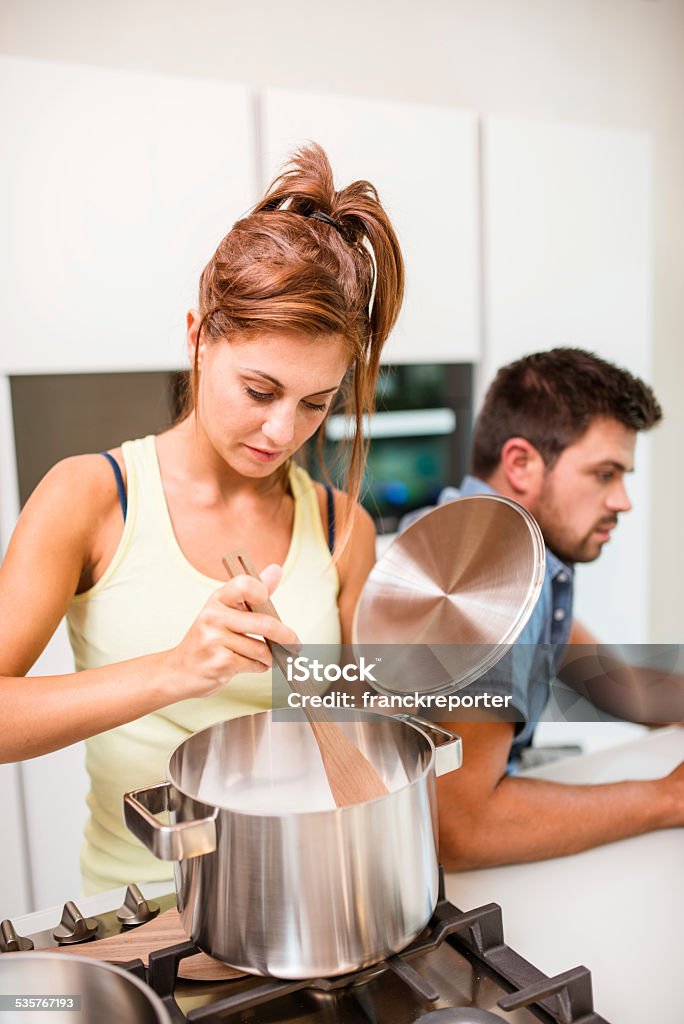 problems in the family Couple on the kitchen Cooking Stock Photo