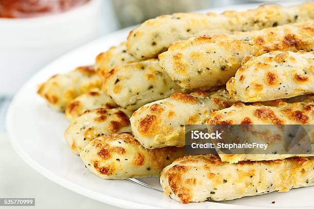 Asiago Cheese Breadsticks And Dip Stock Photo - Download Image Now - Breadstick, Cheese, Garlic Bread