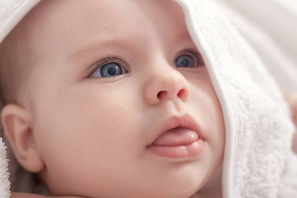 istock Beautiful baby face after shower close up 535772501