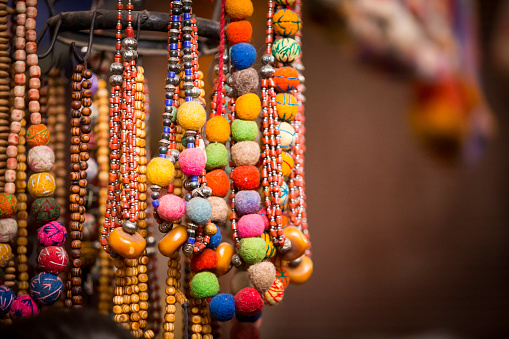 Moroccan colorful handmade beads and jewellery in a street market - Marrakesh souk, Morocco