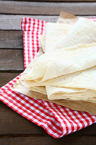 istock Freshly baked pitas on a napkin 535805045