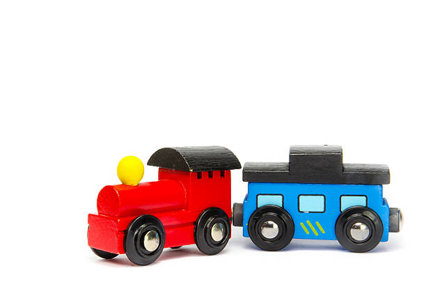 istock Wooden toy train with colorful blocs isolated 535806329