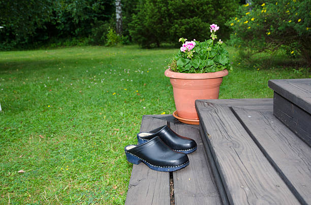 Clogs at a stair stock photo