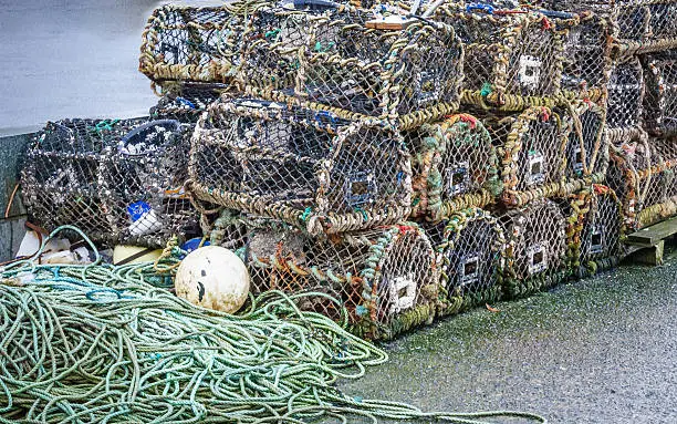 A stack of lobster pots by the sea, ready to used again