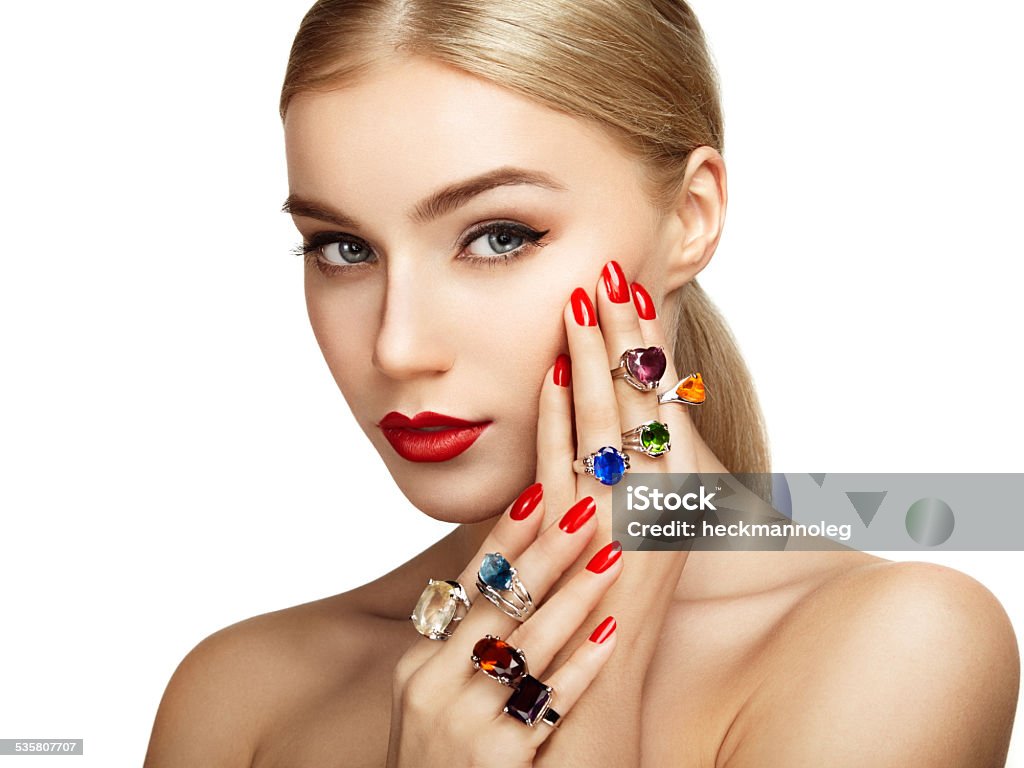Portrait of beautiful woman with jewelry Portrait of beautiful woman with jewelry. Manicure and makeup. Perfect skin. Fashion beauty. Ring. Blonde girl. Close up Jewelry Stock Photo