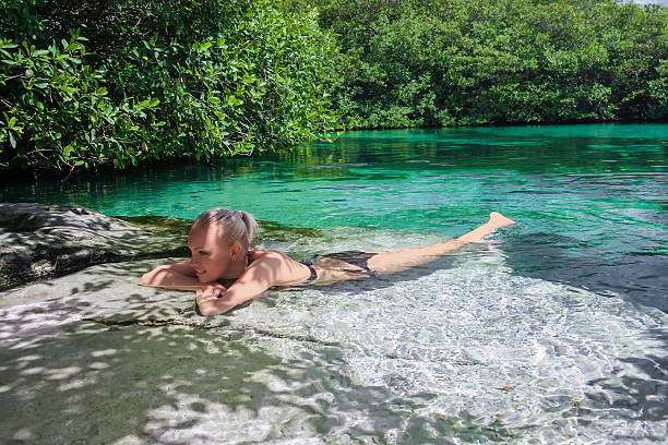 istock Women relax in blue lagoon 535808037