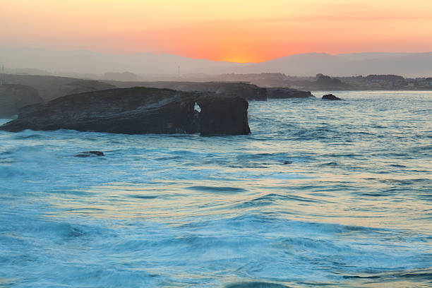 istock Beautiful sunset and stone arches on Playa de las Catedrales 535808367