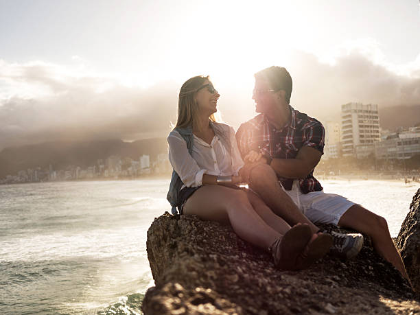 istock Latin American couple talking on a rock. 535809487