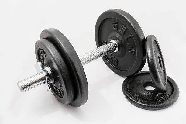istock itness exercise equipment dumbbell weights on white background 535810471