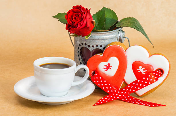 istock Cookies with a cup of coffee and a rose. 535810525