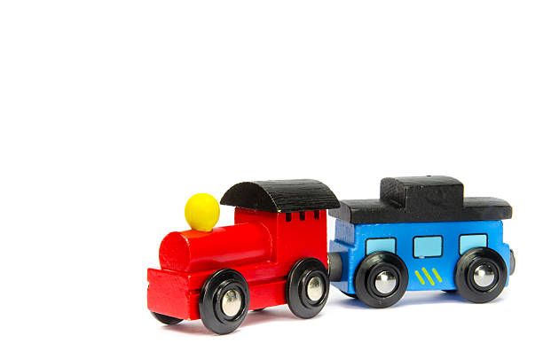 istock Wooden toy train with colorful blocs isolated 535811621