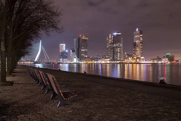 A great night view of Rotterdam, on the left the Erasmus bridge which leads to the Kop van Zuid. The latest building, the Rotterdam, still under construction. This building has been opened on 15 November 2013