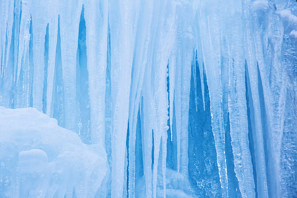 istock Frozen waterfall of blue icicles 535843635