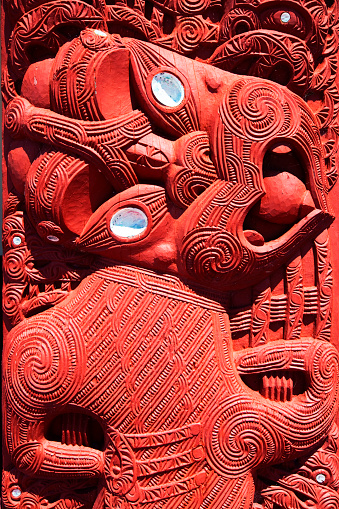 Rotorua, New Zealand - November 11, 2013:Maori wood carving on Te Papaiouru Marae, a Maori meeting house in the tourist town of Rotorua, New Zealand