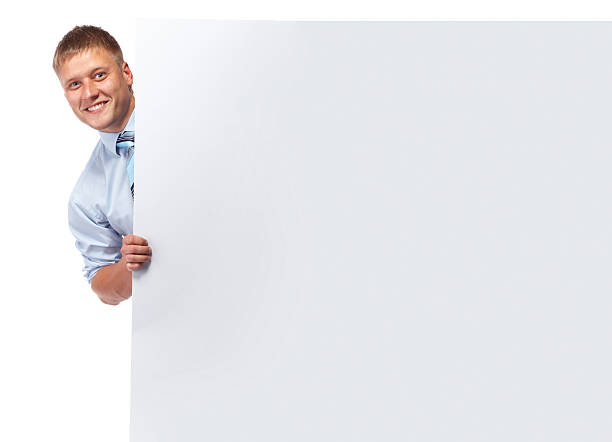 istock Businesmann handing big business card 535846533