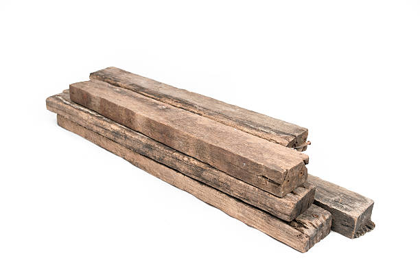 istock Wooden beams and planks isolated on white background 535846945