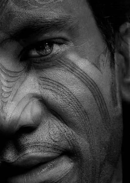 Close up portrait of traditional Maori facial tattoo (moko)