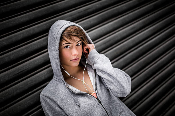 istock Runner Putting Earphones In Ears Before Run 535849141
